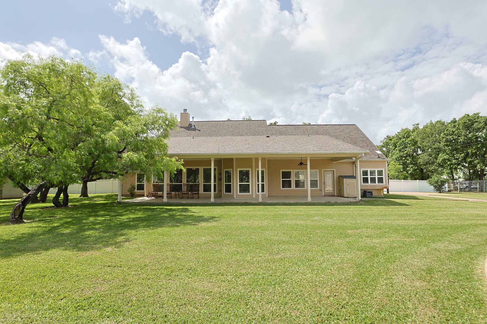 101 Pin Oak Lane Hempstead, TX 77445 - Photo 34 of 50 a view of a big house with a big yard and large trees