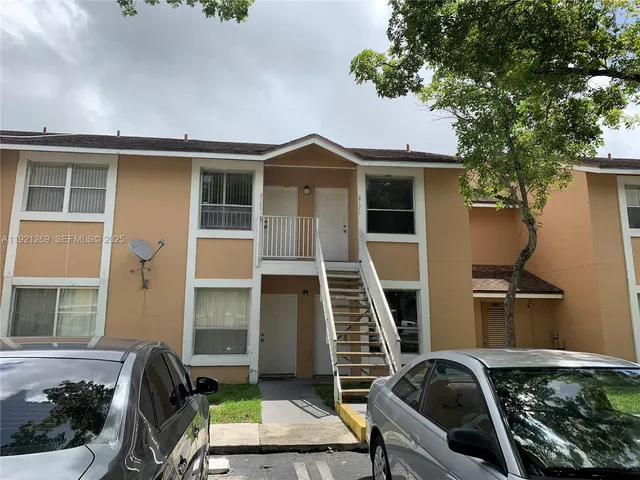 a backyard of a house with seating space