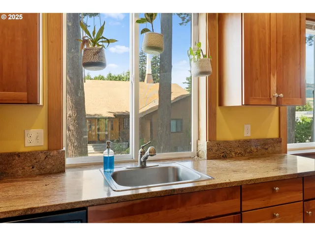 a bathroom with a sink and a large mirror