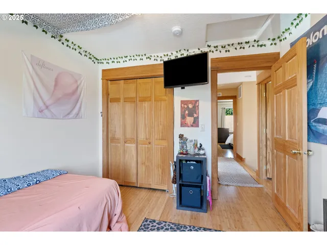 a bedroom with a bed and a view of bathroom