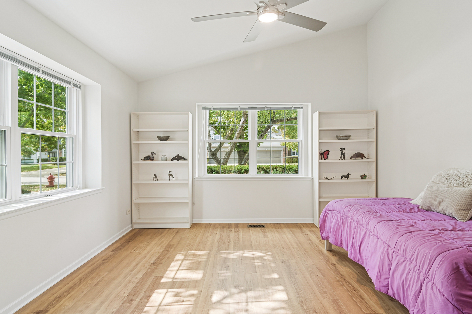 381 Bentley Place Buffalo Grove, IL 60089 - Photo 14 of 22 a bedroom with a bed and a window