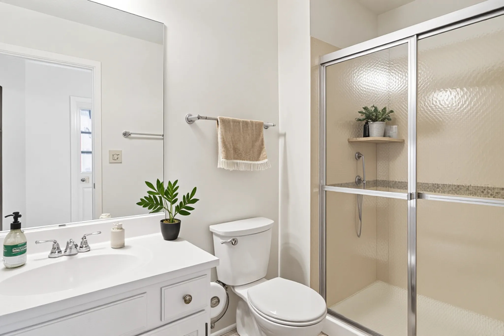 381 Bentley Place Buffalo Grove, IL 60089 - Photo 16 of 22 a bathroom with a sink a toilet and shower