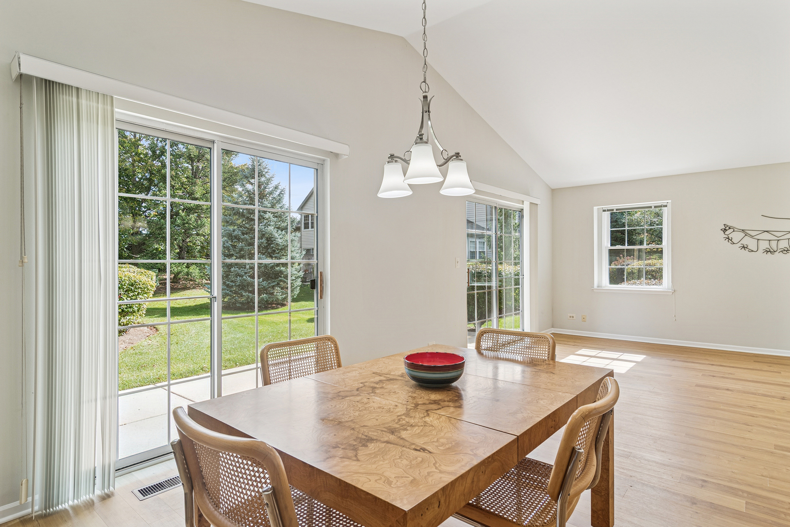 381 Bentley Place Buffalo Grove, IL 60089 - Photo 7 of 22 a view of a dining room with furniture window and outside view