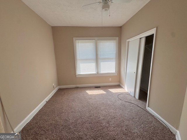 820 Peeples Street Southwest, Unit 820 Atlanta, GA 30310 - Photo 11 of 37 an empty room with windows and closet