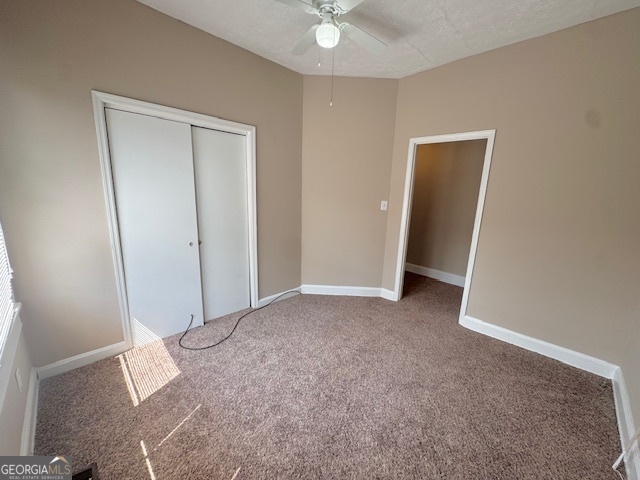 820 Peeples Street Southwest, Unit 820 Atlanta, GA 30310 - Photo 13 of 37 an empty room with closet and fan