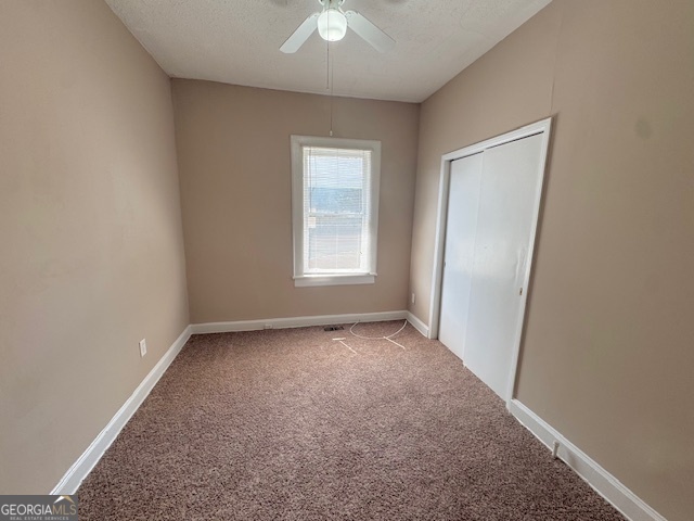 820 Peeples Street Southwest, Unit 820 Atlanta, GA 30310 - Photo 15 of 37 an empty room with windows and closet