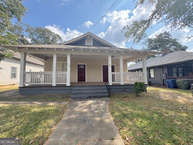 820 Peeples Street Southwest, Unit 820 Atlanta, GA 30310 - Photo 2 of 37 a view of a house with a yard and large tree