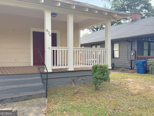 820 Peeples Street Southwest, Unit 820 Atlanta, GA 30310 - Photo 3 of 37 a view of a house with a small yard and flower plants