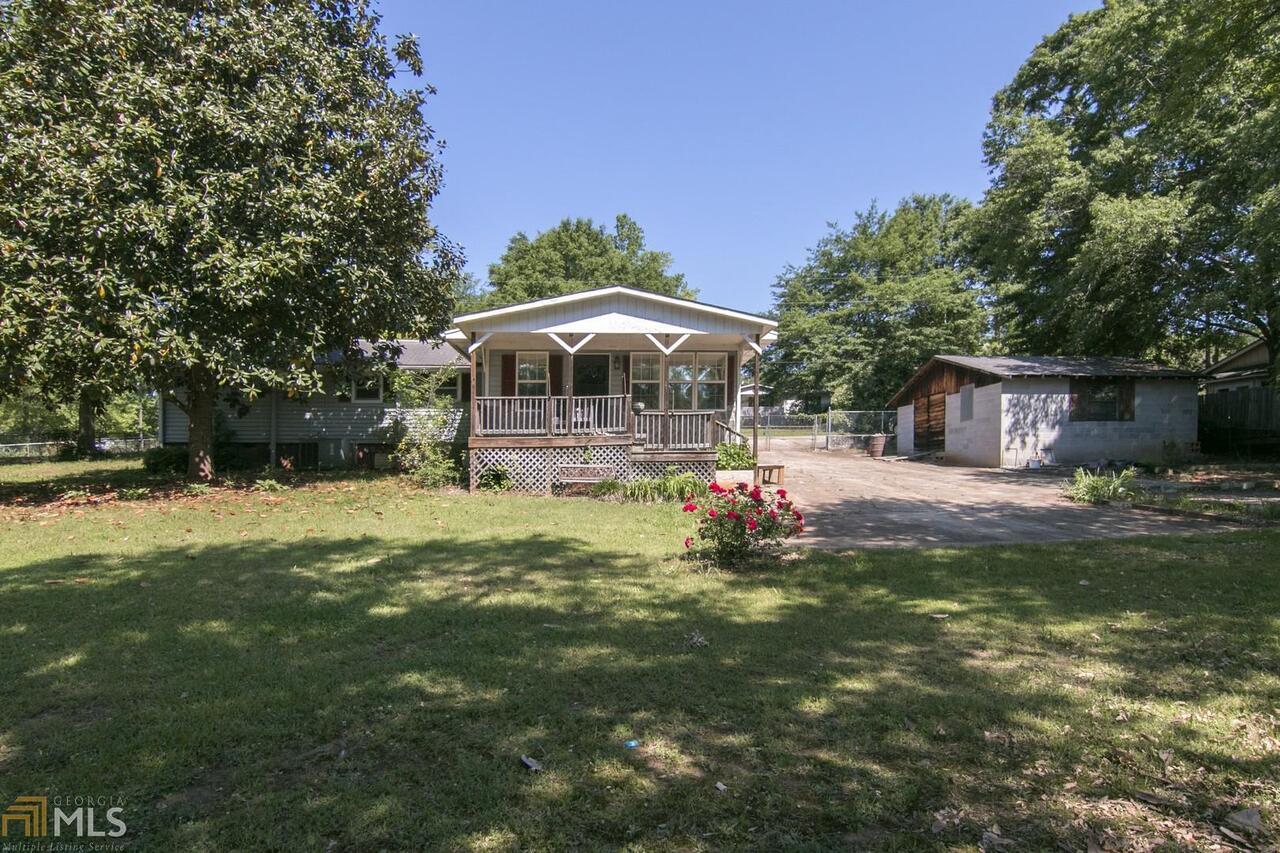 182 Southern Shores Road Jackson, GA 30233 - Photo 1 of 1 Cute Waterfront Home on Deeded Lot