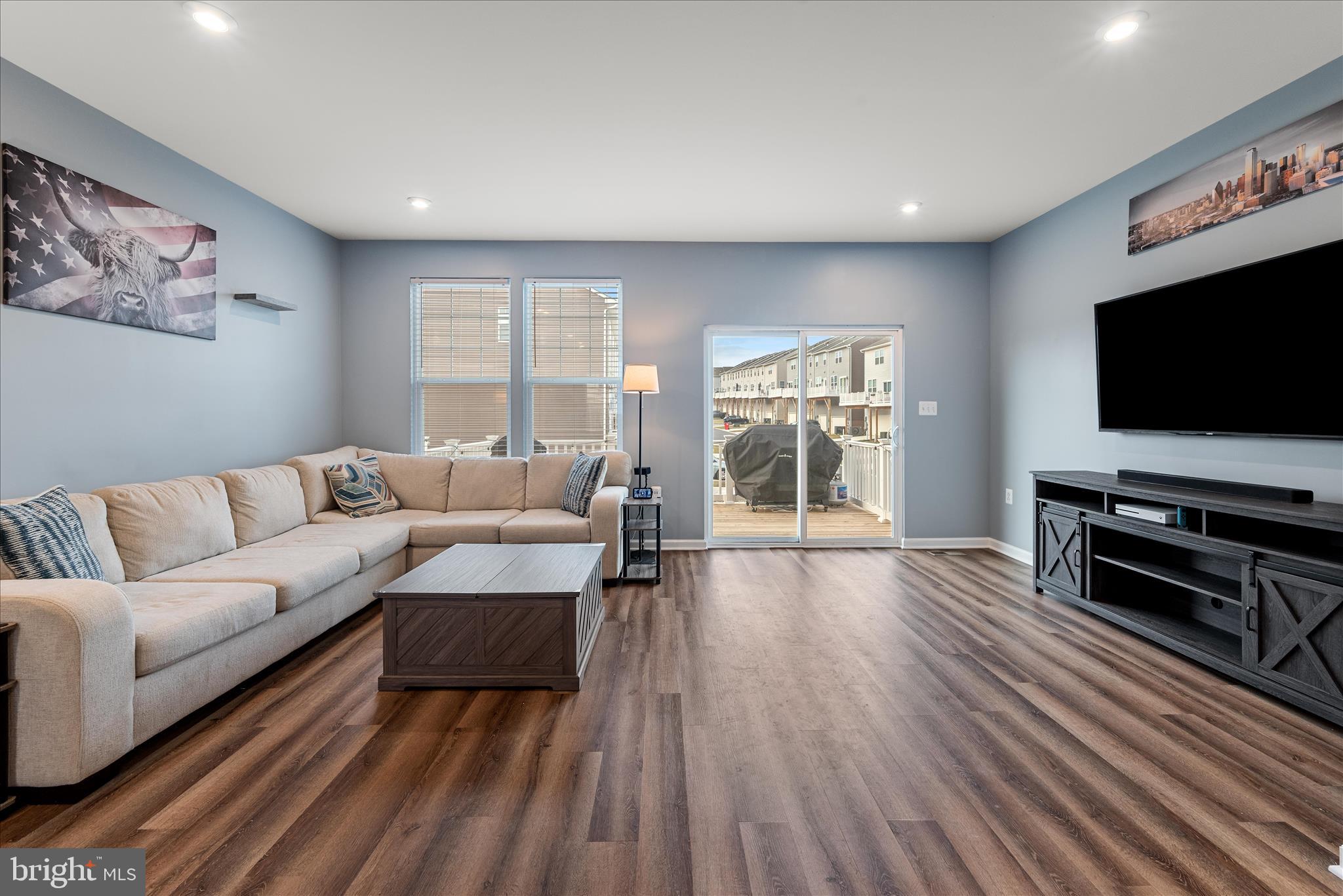 504 National Street Ranson, WV 25438 - Photo 11 of 33 a living room with furniture and a flat screen tv
