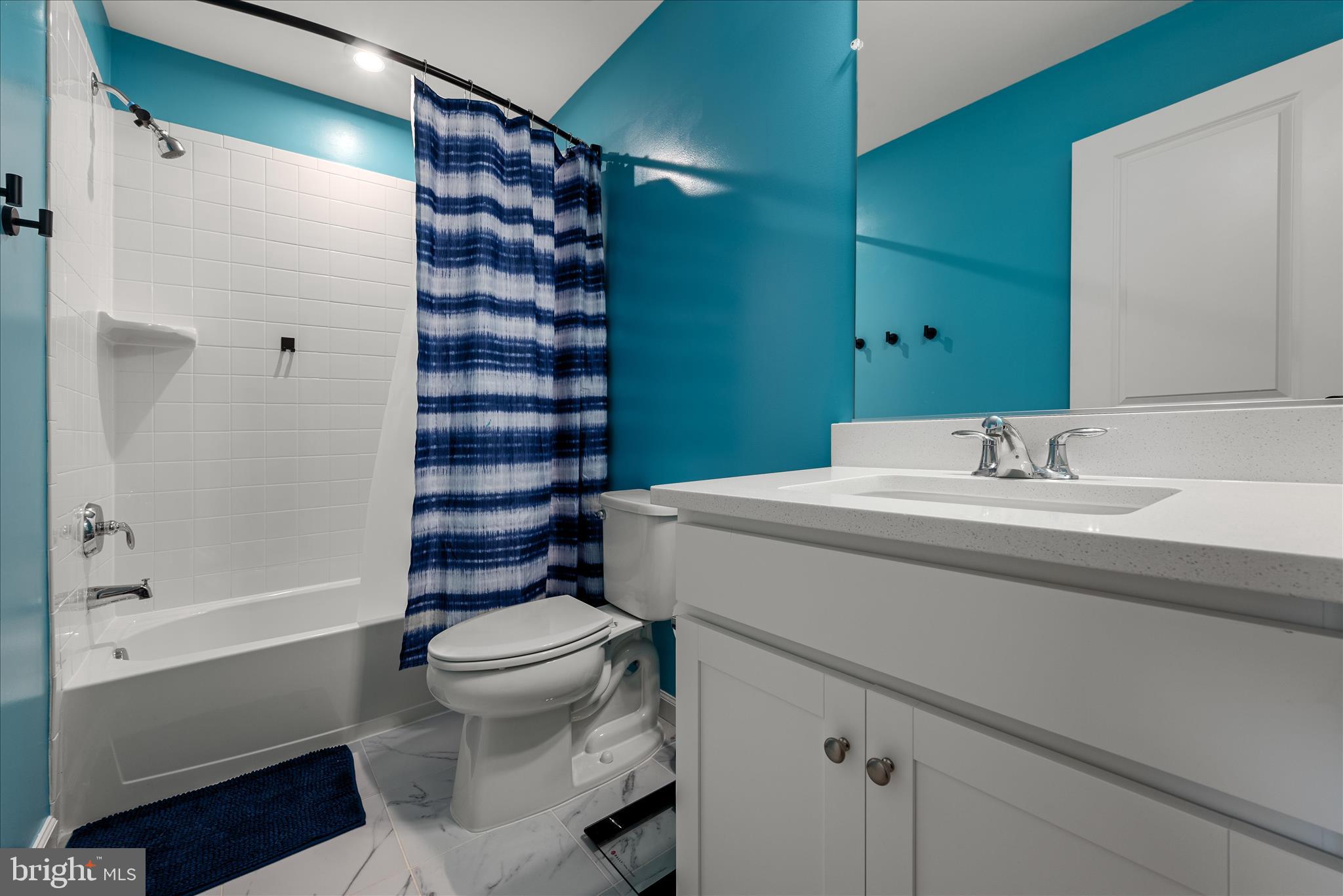 504 National Street Ranson, WV 25438 - Photo 23 of 33 a bathroom with a sink a toilet and shower