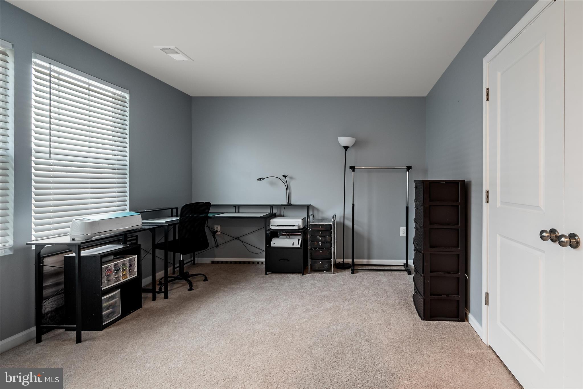 504 National Street Ranson, WV 25438 - Photo 27 of 33 a room with furniture and a flat screen tv