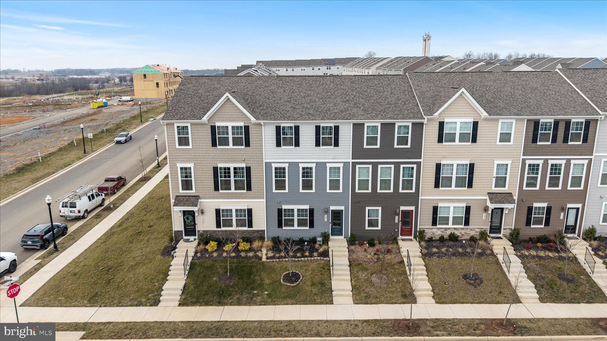 504 National Street Ranson, WV 25438 - Photo 30 of 33 a front view of a residential apartment building with a yard
