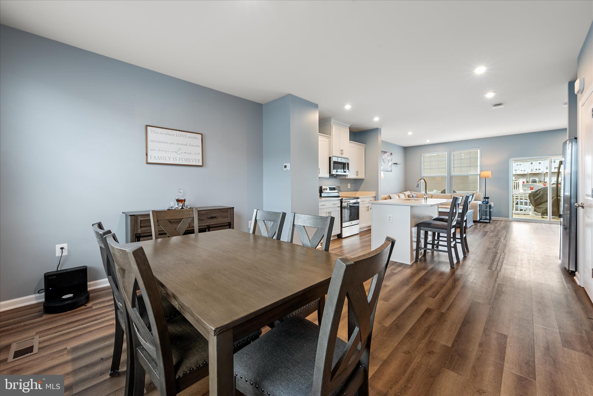 504 National Street Ranson, WV 25438 - Photo 7 of 33 a view of a dining room with furniture and wooden floor