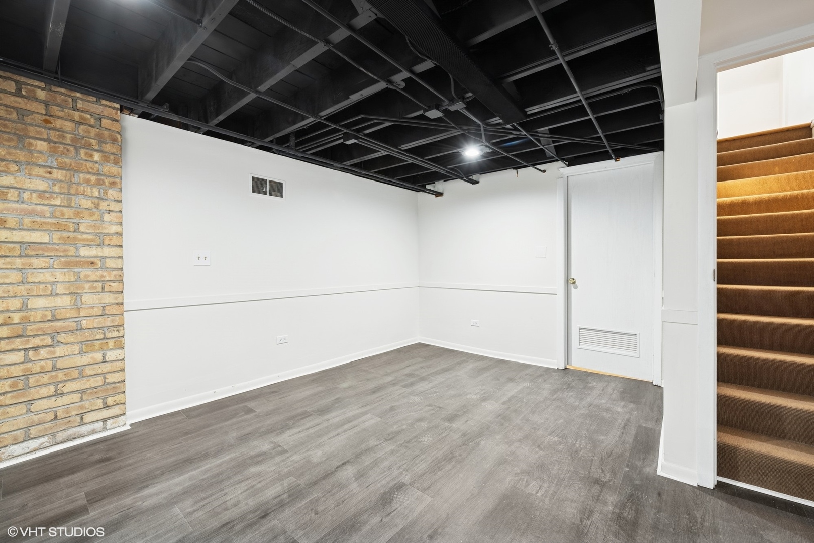 419 June Terrace Barrington, IL 60010 - Photo 13 of 18 a view of a room with wooden walls