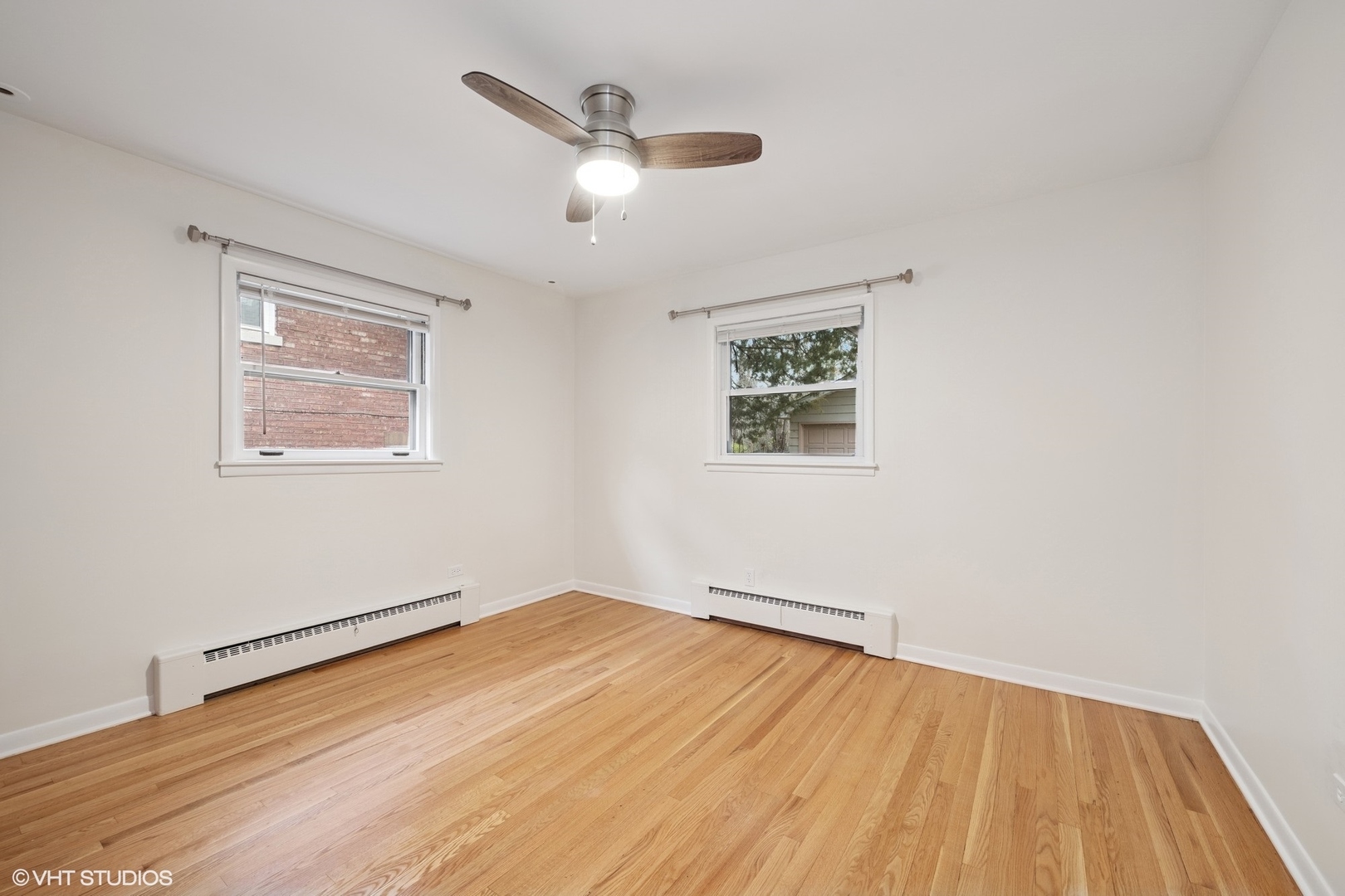 419 June Terrace Barrington, IL 60010 - Photo 7 of 18 a view of empty room with wooden floor