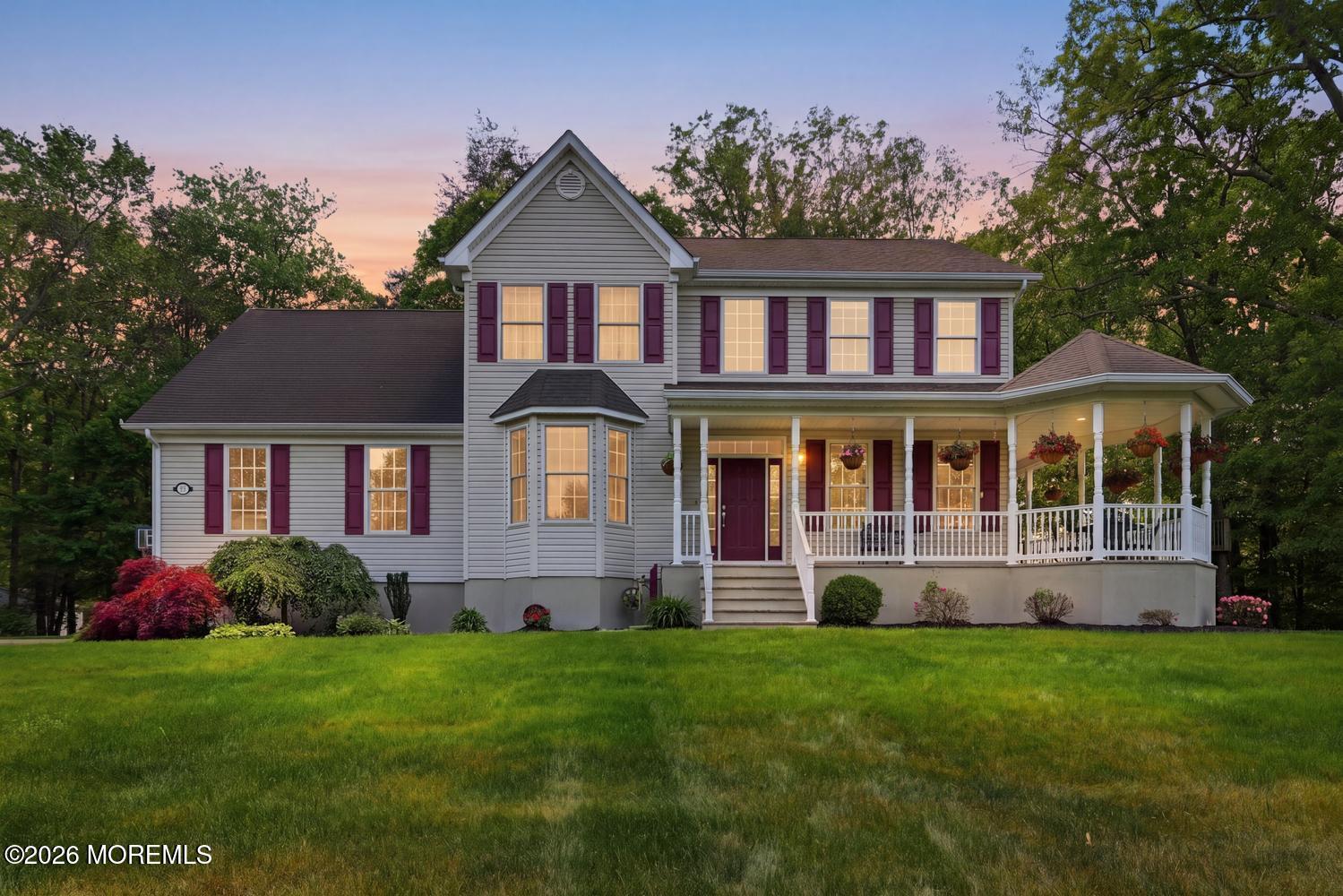 7 Cherry Tree Lane Cream Ridge, NJ 08514 - Photo 1 of 47 a front view of a house with a yard