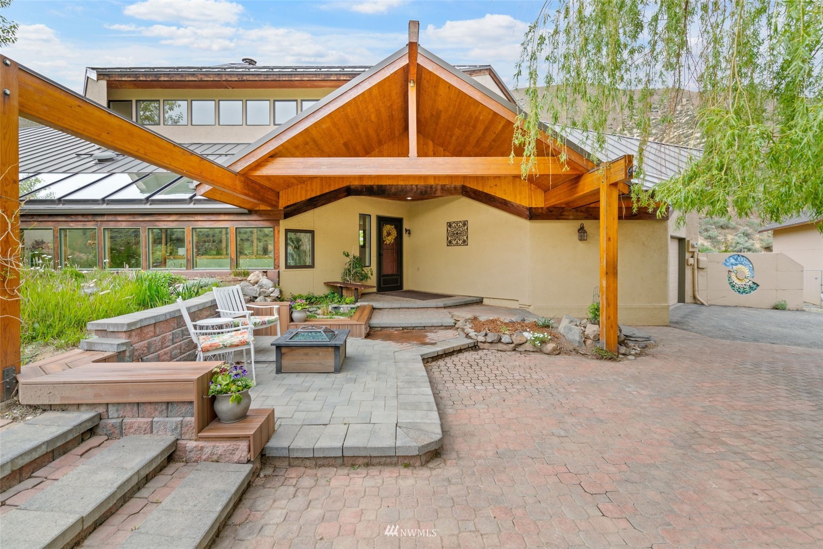 1666 Pitcher Canyon Road Wenatchee, WA 98801 - Photo 1 of 37 a view of a house with backyard
