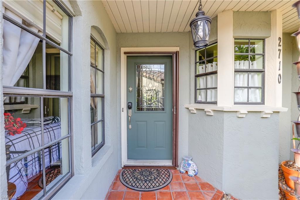 2708 Santa Cruz Boulevard Naples, FL 34112 - Photo 11 of 38 a view of walk in closet with clothes and shoes