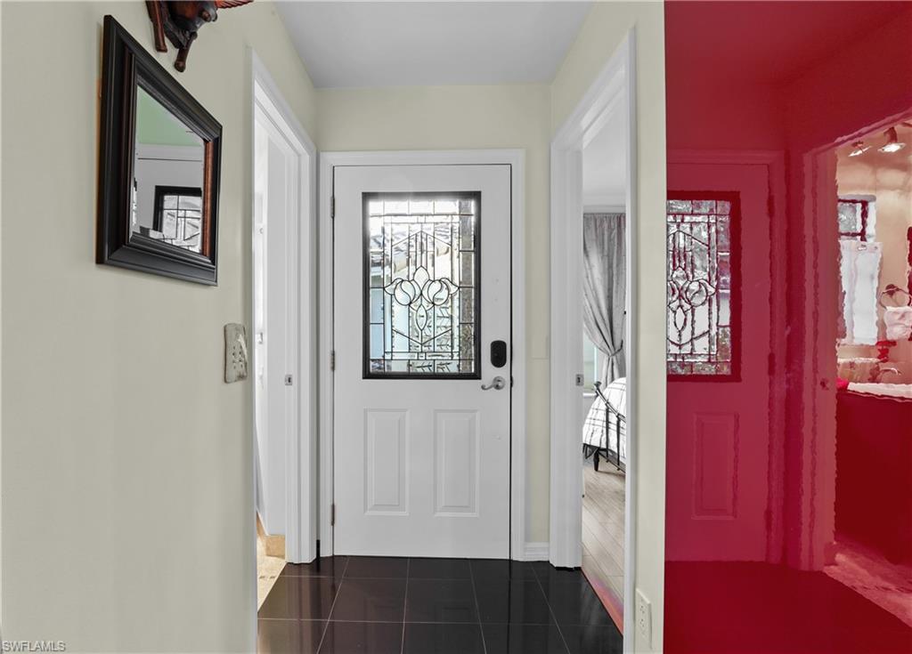 2708 Santa Cruz Boulevard Naples, FL 34112 - Photo 15 of 38 a view of front door with yard