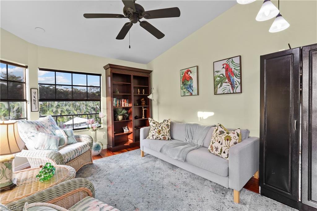 2708 Santa Cruz Boulevard Naples, FL 34112 - Photo 16 of 38 a living room with furniture and a large window