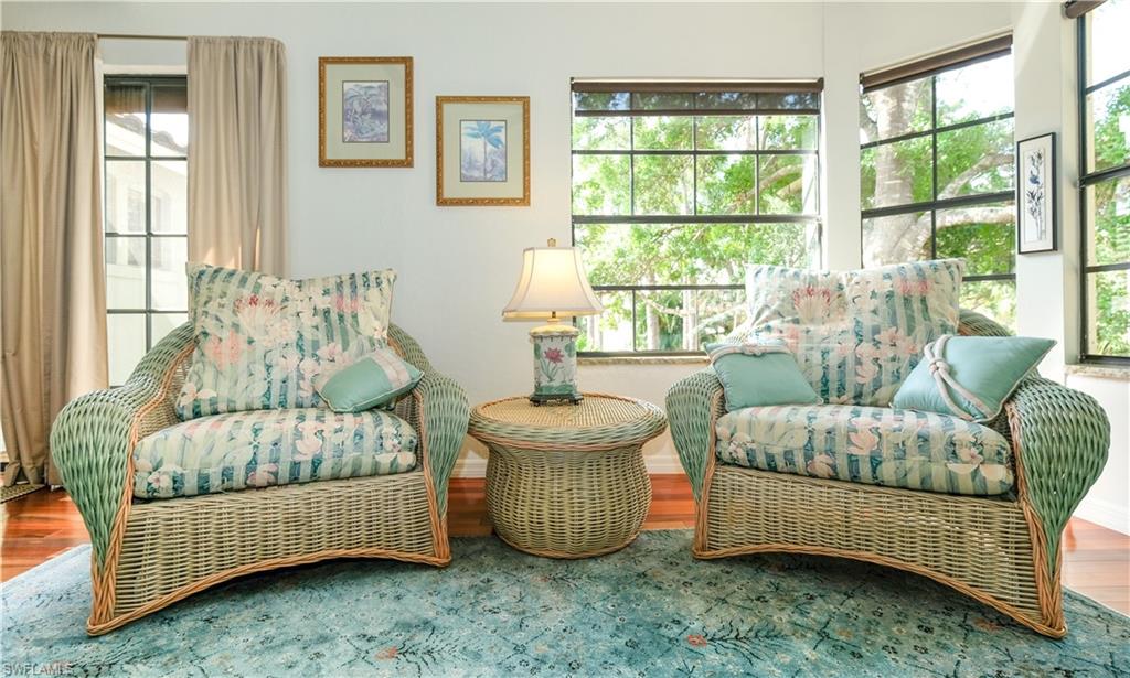 2708 Santa Cruz Boulevard Naples, FL 34112 - Photo 19 of 38 a living room with furniture and a window