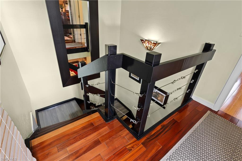 2708 Santa Cruz Boulevard Naples, FL 34112 - Photo 24 of 38 a bedroom with furniture and a window