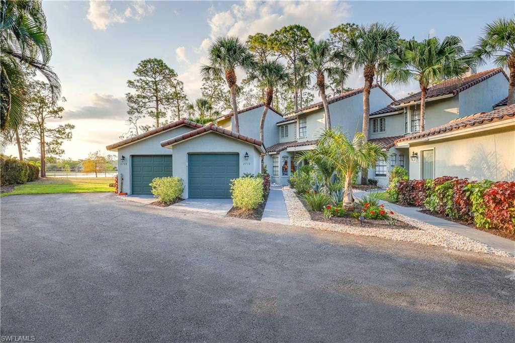 2708 Santa Cruz Boulevard Naples, FL 34112 - Photo 3 of 38 a view of a house with backyard and garden