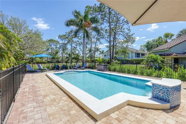 a view of a lake with a houses