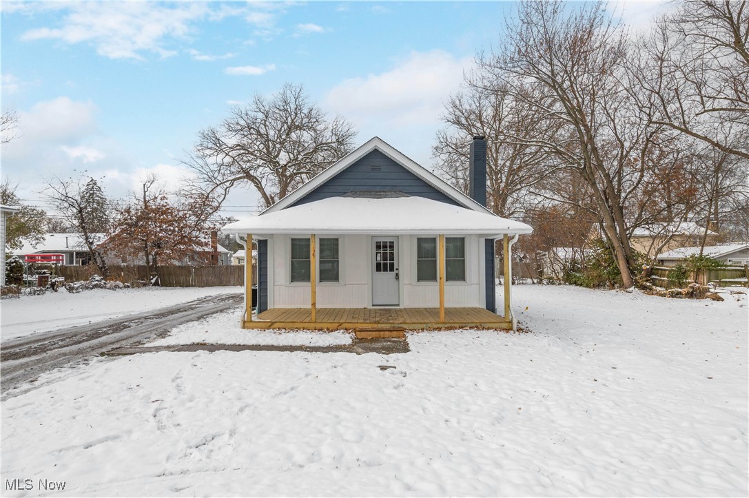 218 Roxboro Road Vermilion, OH 44089 - Photo 1 of 50 Bungalow with a wooden deck