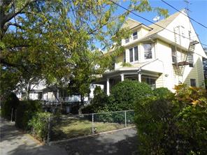 36 Park Avenue, Unit 2 New Rochelle, NY 10805 - Photo 1 of 1 a backyard of a house with lots of green space
