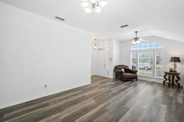 a view of livingroom with furniture and chandelier
