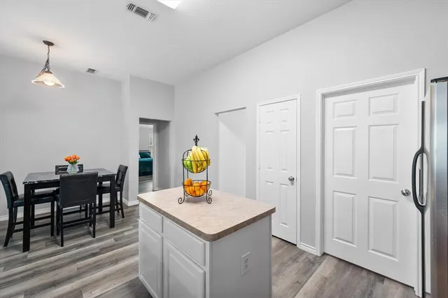 a view of dining room and wooden furniture