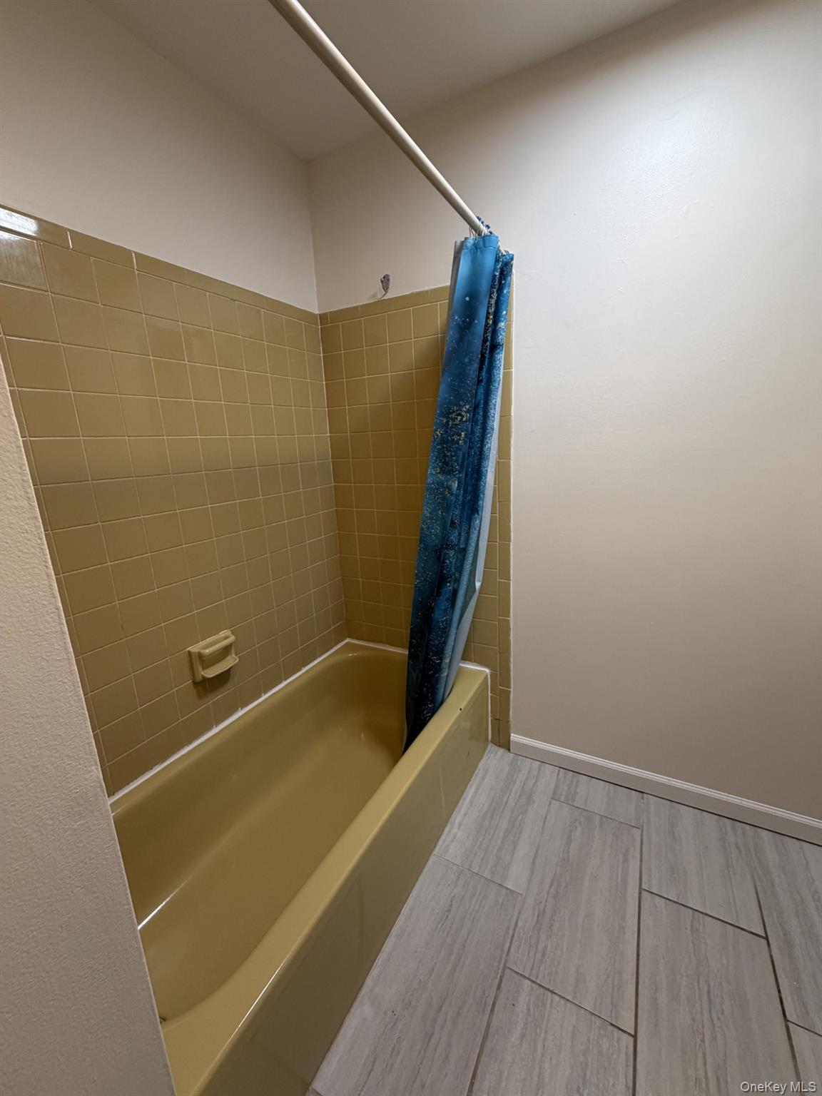 7 Ivy Court, Unit B Fishkill, NY 12524 - Photo 9 of 15 a bathroom with a tub and shower