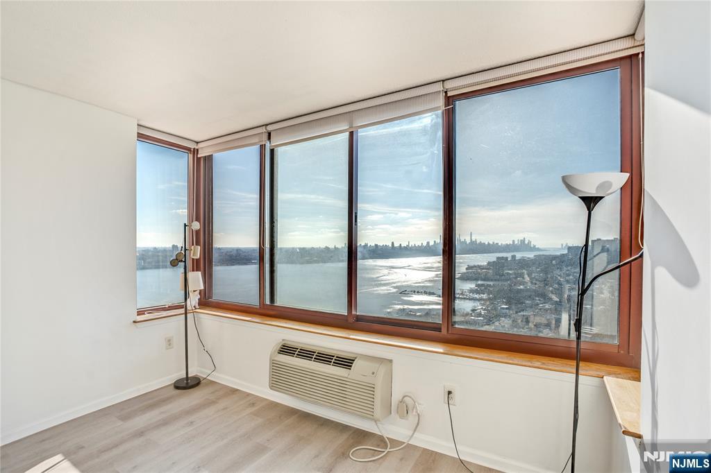 100 Old Palisade Road, Unit 2709 Fort Lee, NJ 07024 - Photo 3 of 15 a view of a living room with a large window