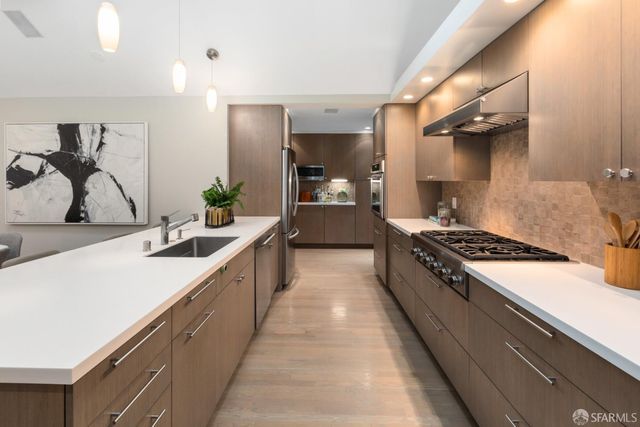 a bedroom with bed lamp and furniture