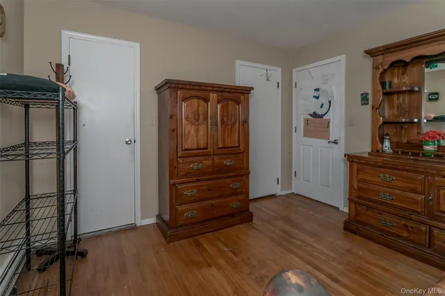 wooden floor and closet in a room