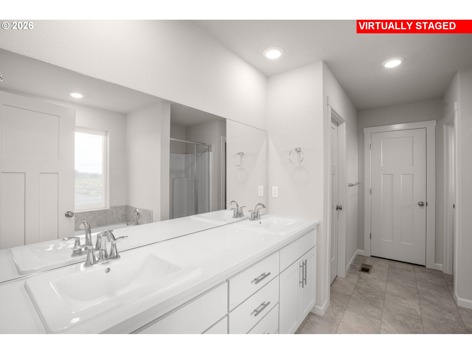1109 Clemson Street Gervais, OR 97026 - Photo 21 of 22 a bathroom with a sink double vanity and a mirror