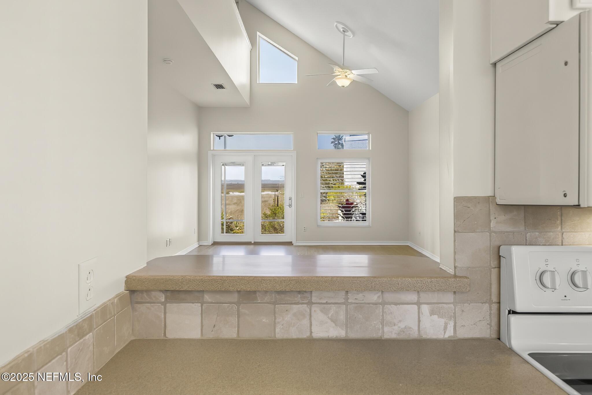 180 Kingston Drive St. Augustine, FL 32084 - Photo 11 of 55 Kitchen Passthrough to Living Area