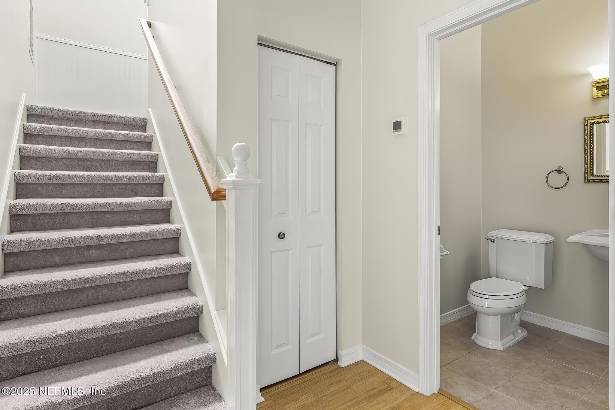 180 Kingston Drive St. Augustine, FL 32084 - Photo 28 of 55 a view of a room that has a wine table and chairs