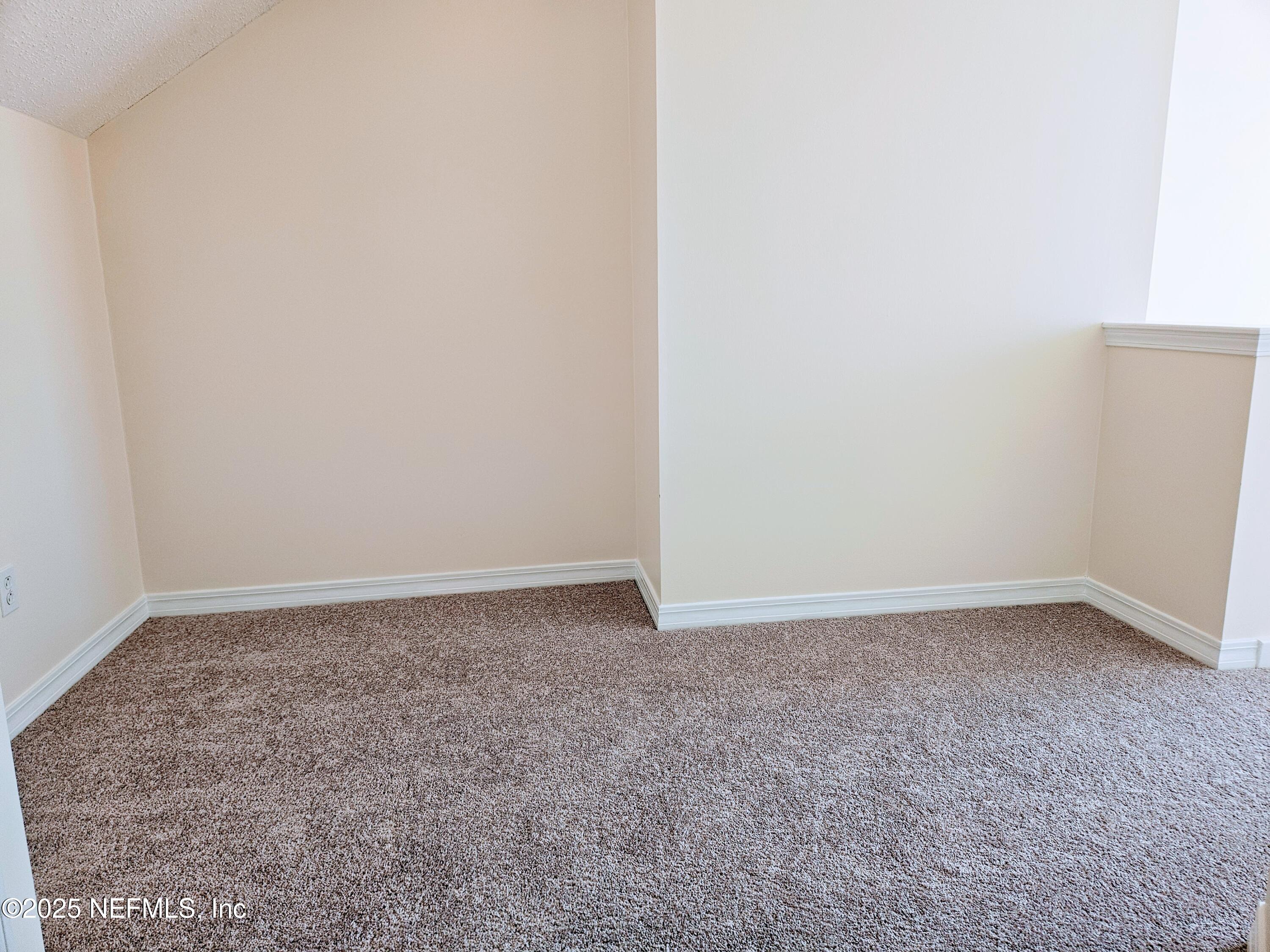 180 Kingston Drive St. Augustine, FL 32084 - Photo 29 of 55 a view of an empty room