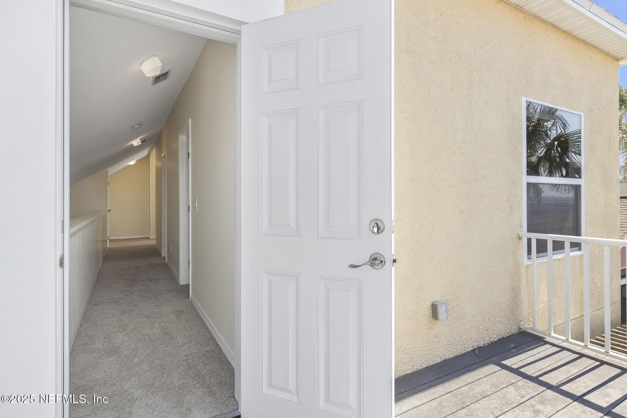 180 Kingston Drive St. Augustine, FL 32084 - Photo 37 of 55 a view of a hallway with closet and bathroom