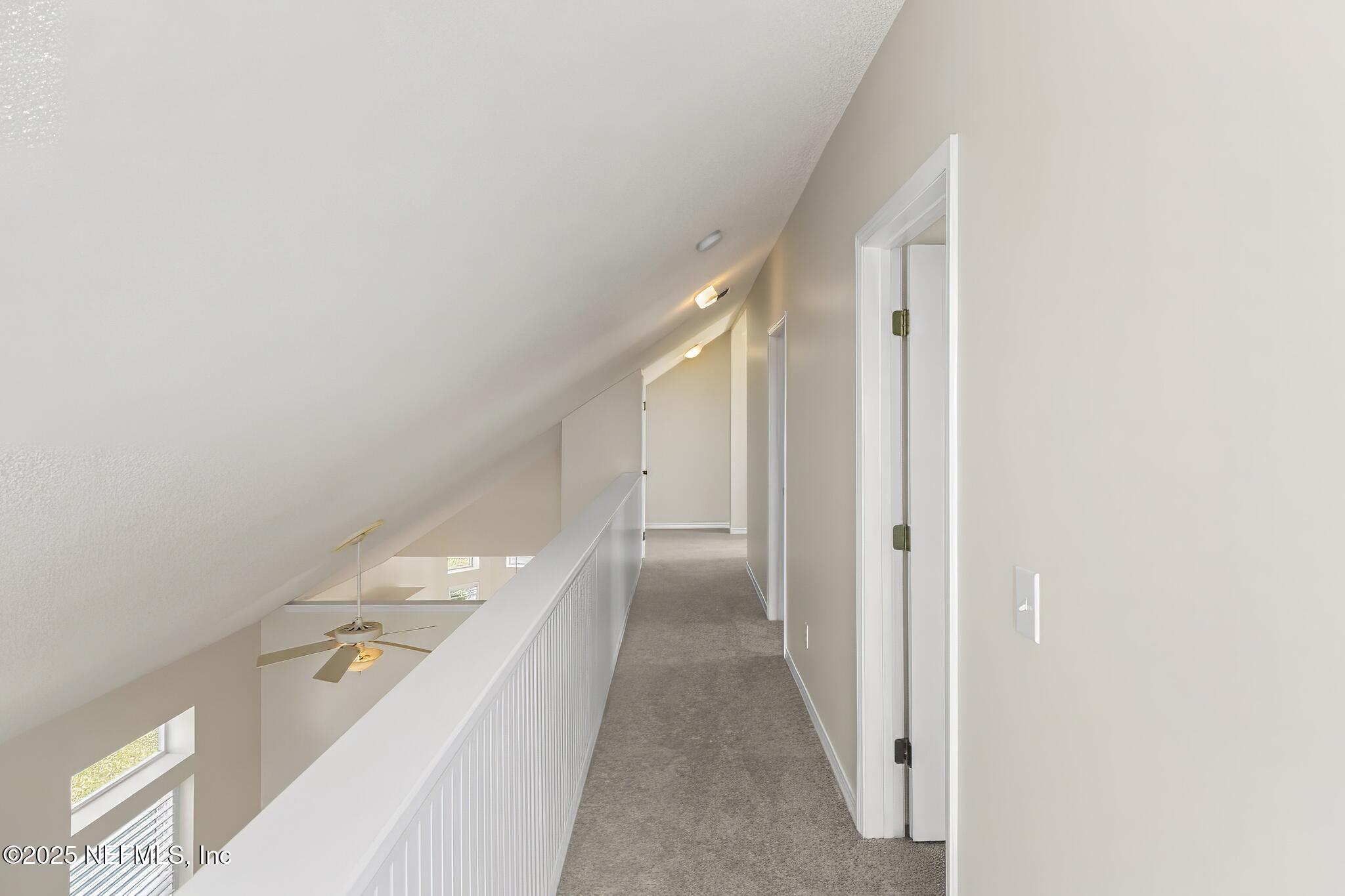 180 Kingston Drive St. Augustine, FL 32084 - Photo 38 of 55 a view of a hallway with closet