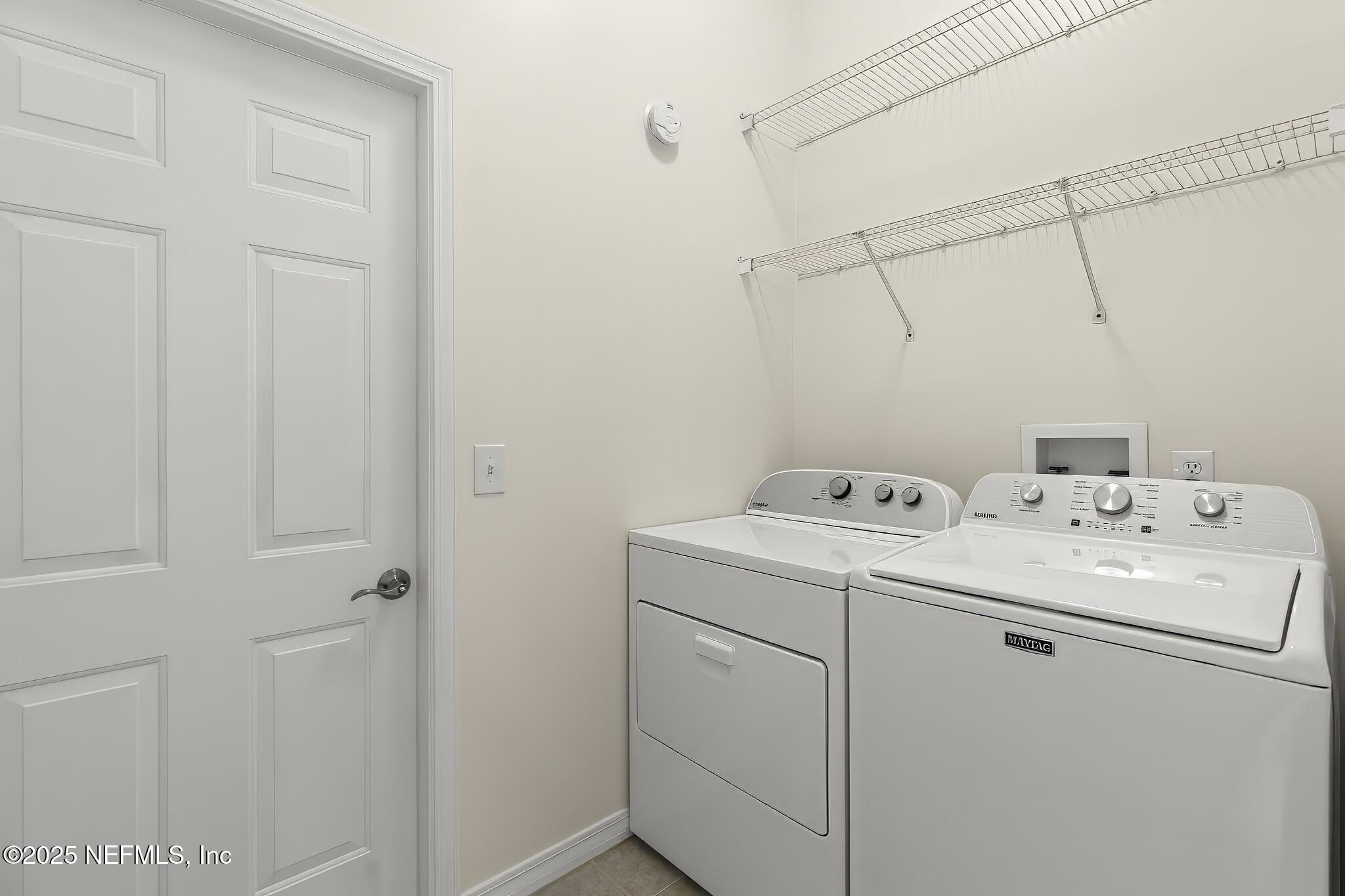 180 Kingston Drive St. Augustine, FL 32084 - Photo 40 of 55 a utility room with dryer and washer