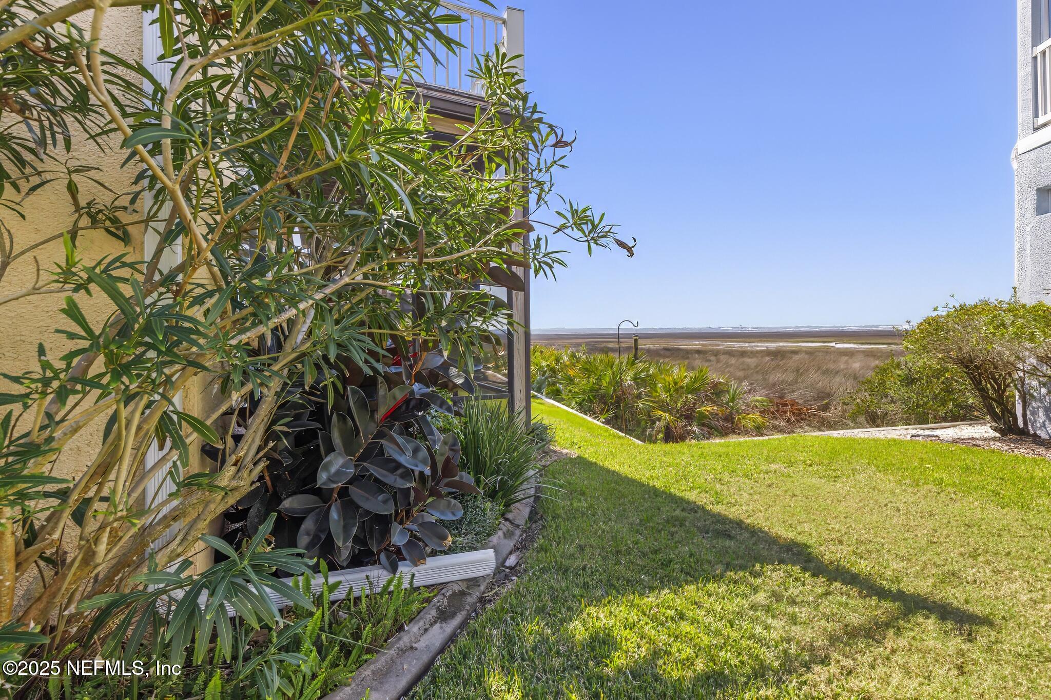 180 Kingston Drive St. Augustine, FL 32084 - Photo 43 of 55 a view of a yard with an outdoor space