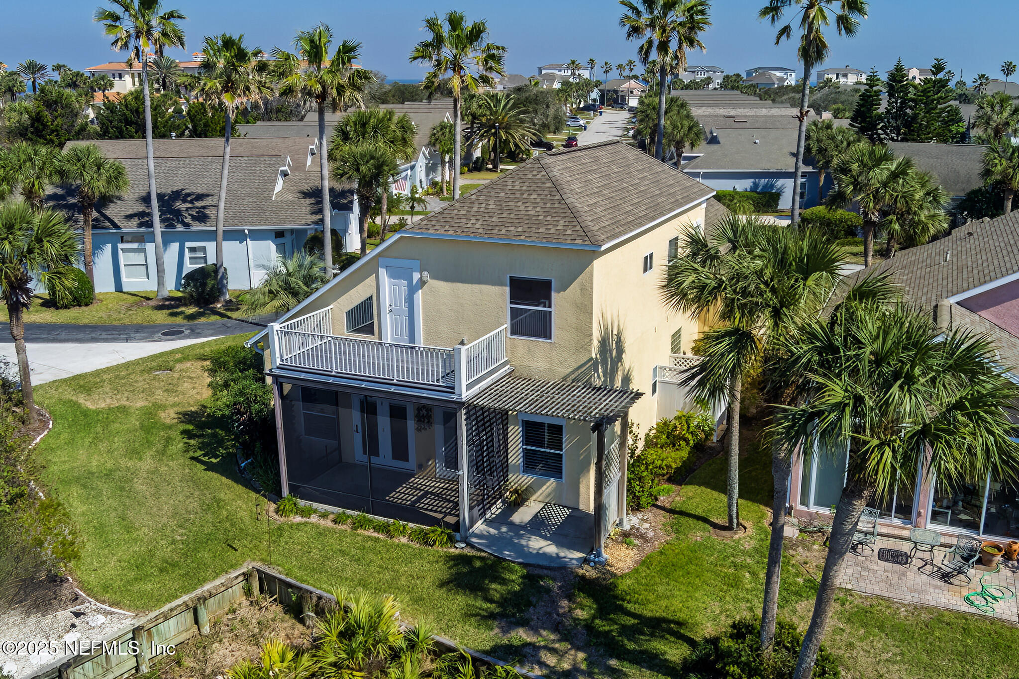 180 Kingston Drive St. Augustine, FL 32084 - Photo 46 of 55 an aerial view of a house with swimming pool garden and patio