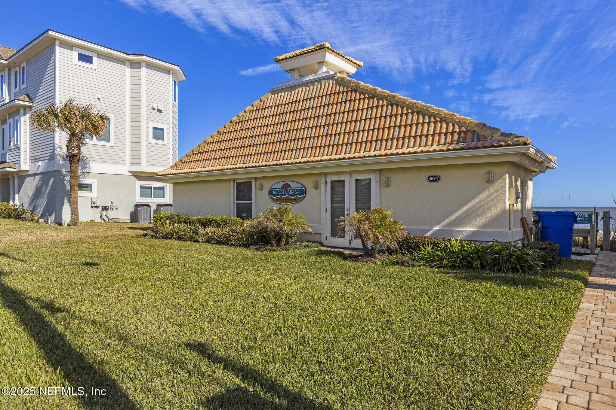 180 Kingston Drive St. Augustine, FL 32084 - Photo 49 of 55 a front view of a house with garden