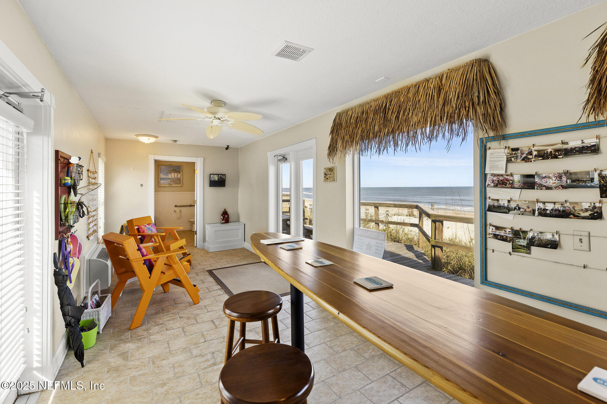 180 Kingston Drive St. Augustine, FL 32084 - Photo 52 of 55 a living room with furniture and wooden floor