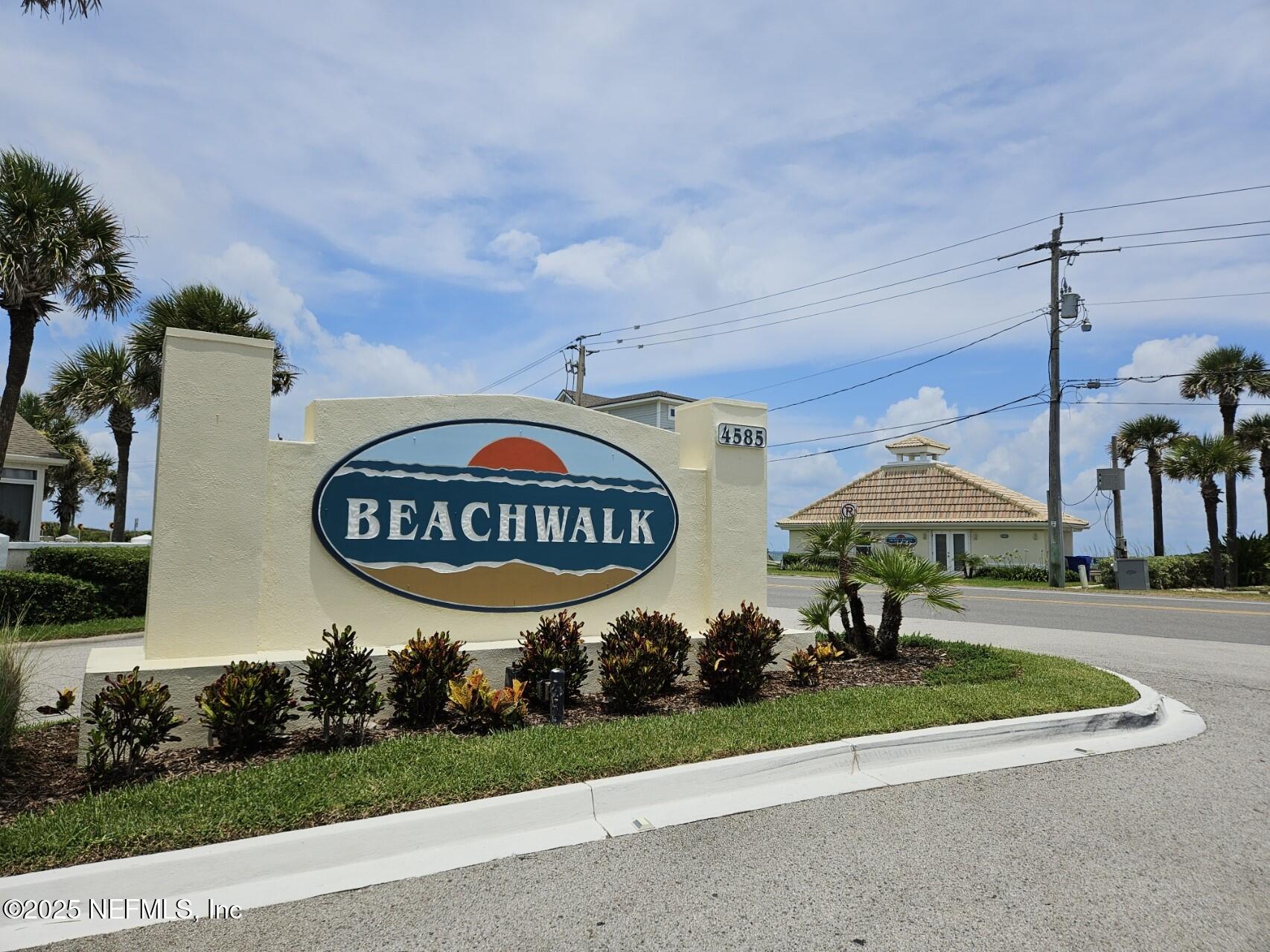 180 Kingston Drive St. Augustine, FL 32084 - Photo 55 of 55 a view of a table and chairs under an umbrella in backyard