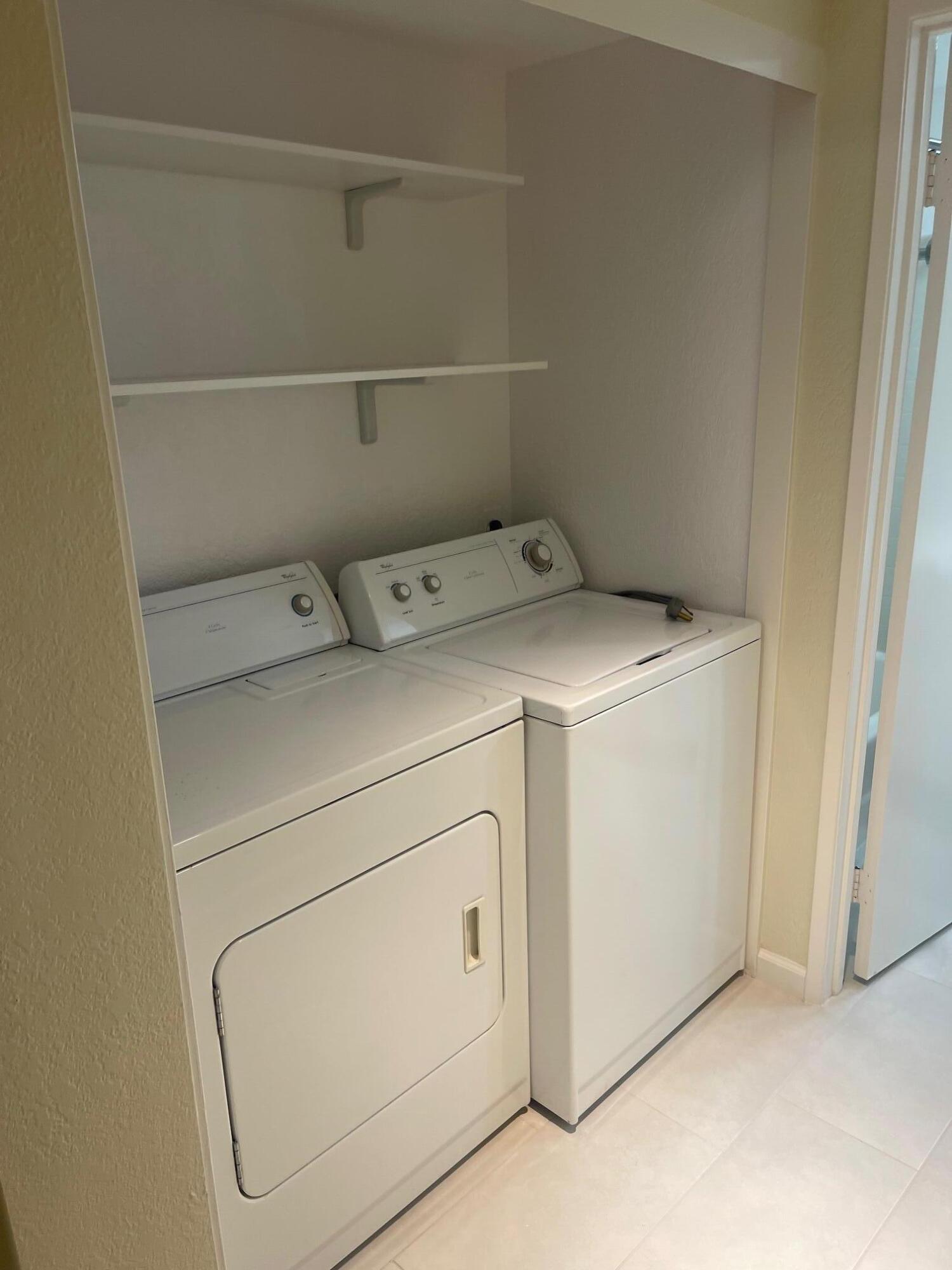2700 Lawrence Crossley Road, Unit 4 Palm Springs, CA 92264 - Photo 17 of 18 a utility room with dryer and washer